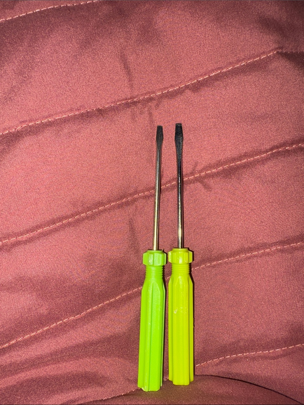 Two Neon Green Flathead Screwdrivers